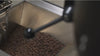 Close-up of coffee beans being small-batch roasted